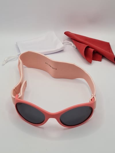 Babyzonnebril maat 2-18 maanden / antislip baby bril K 111 kat 3 UV 400 / perzik kleur montuur + getinte grijze lenzen / kraamcadeau meisje / baby glasses / lunettes de soleil bébé / Aland optiek / zonnebril kind pasgeboren jongen of meisje