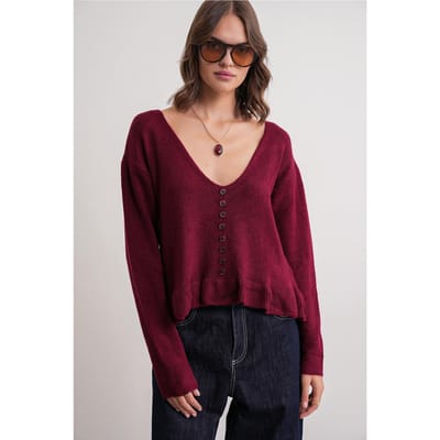 Lichte V-hals gebreide top met knoopdetails