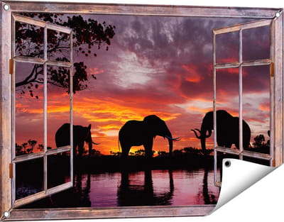 Gards Tuinposter Doorkijk Olifanten tijdens Zonsondergang - Silhouet - 90x60 cm - Tuindoek - Tuindecoratie - Wanddecoratie buiten - Tuinschilderij