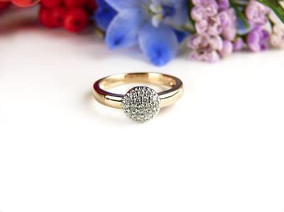 ring in roos goud en wit goud gezet met diamant