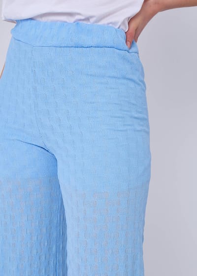 Hemelsblauwe broek met elastische taille en uitlopende pijpen
