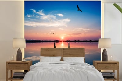 Behang - Fotobehang Steiger - Water - Zonsondergang - Roze - Horizon - Breedte 300 cm x hoogte 300 cm