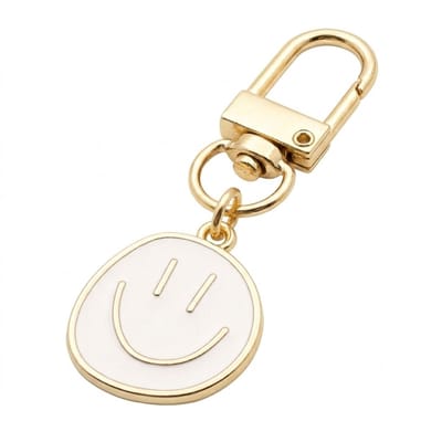 Goudkleurige smiley sleutelhanger metalen sleutelhanger dames en heren met roze emaille smiley hanger en karabijnhaak, decoratieve keychain voor sleutels, tas en rugzak