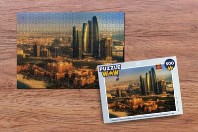 Puzzel Zonnestralen schijnen over de wolkenkrabbers van Abu Dhabi in Azië - Legpuzzel - Puzzel 500 stukjes