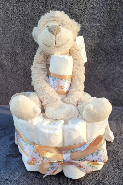 Luiertaart Hello world - zand - strik - funnies - kruidvat - sokjes - kraamgeschenk