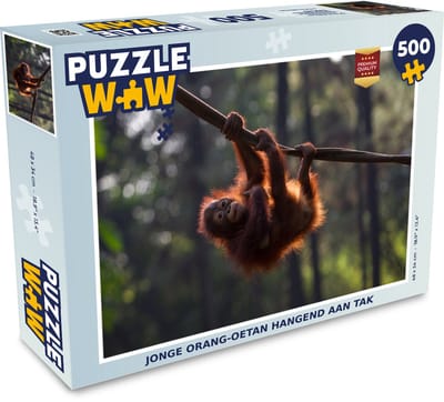 Puzzel Jonge orang-oetan hangend aan tak - Legpuzzel - Puzzel 500 stukjes