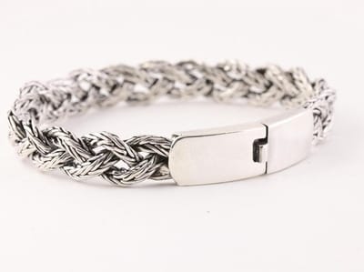 Zware gevlochten zilveren armband met kliksluiting - lengte 19 cm