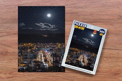 Puzzel De stad Quito in Ecuador verlicht door een volle maan - Legpuzzel - Puzzel 500 stukjes