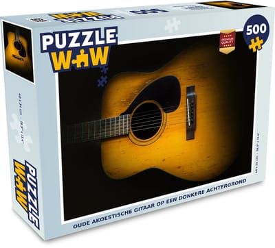 Puzzel Oude akoestische gitaar op een donkere achtergrond - Legpuzzel - Puzzel 500 stukjes