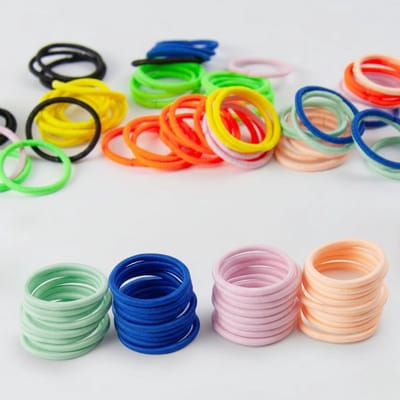 Famanu - 100 Stuks Mini elastiekjes voor baby’s/peuters, 2 mm, 10 gemengde kleuren