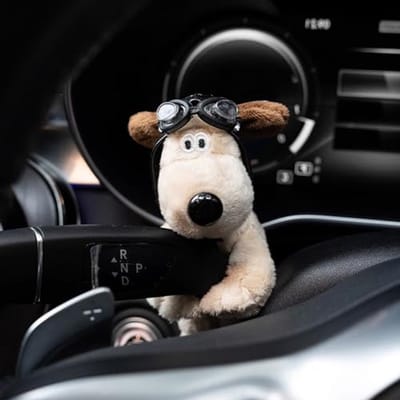 Autodecoratie hond - Pluche dier - Dashboard decoratie - Zacht en duurzaam - 15 cm hoogte - Zwart
