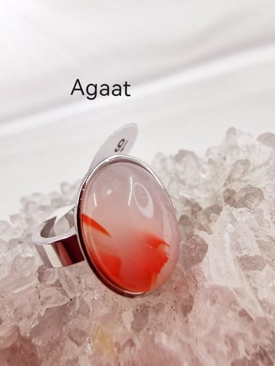 Ring - RVS - edelsteen - agaat - Oranje - ovaal - Zilverkleurig - maat 17 - Edelsteen ringen zijn niet alleen prachtige sieraden, maar ook dragers van diepe betekenis en symboliek.