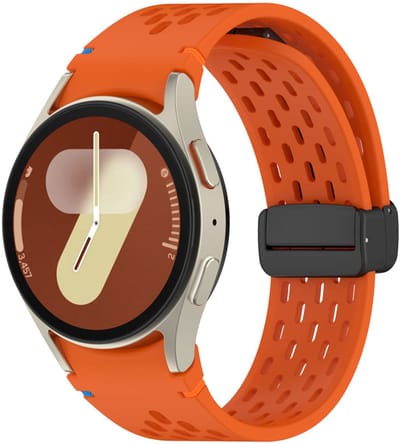Siliconen bandje - geschikt voor Samsung Galaxy Watch 7 (40 & 44mm) / Watch 6 (Classic) / Watch 5 (Pro) / Watch 4 (Classic) / Watch FE - mageneetsluiting met gaatjes - oranje