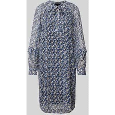 Knielange jurk met strikdetail