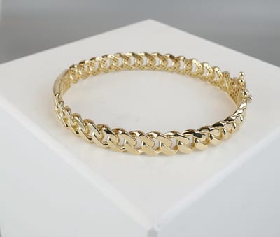 Christian Dames schakelarmband - Goud
