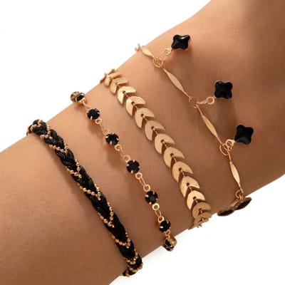 Zwart goudkleurig armbandenset dames schakel armbanden set van 4 met gevlochten armband bloemen bedels kralen armband minimalistische verstelbare sieraden set