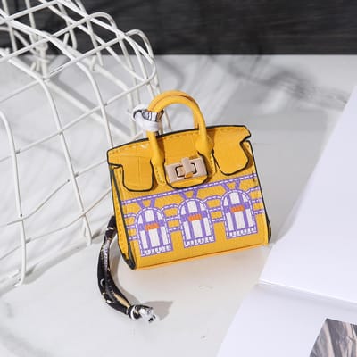 Mini tas hanger huis kleine tas nieuwe mode hanger mond rode envelop oordopjes charter sleutel geel