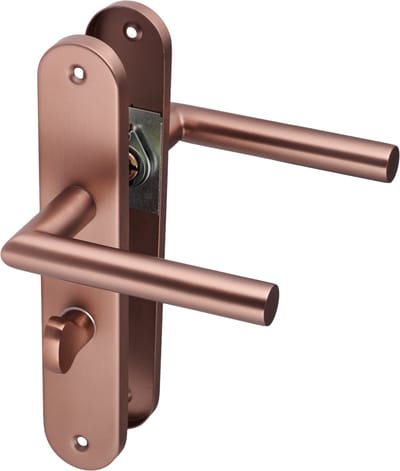 Ostiumhome® Ferrano - Deurbeslag - Deurklink op Rond Schild - Met WC/Badkamer-Slot - PC 63mm - Mat Koper - Complete Set