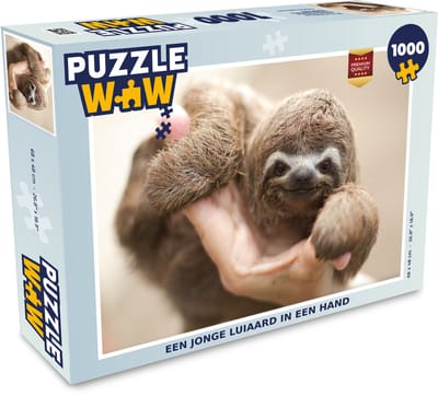Puzzel Een jonge luiaard in een hand - Legpuzzel - Puzzel 1000 stukjes volwassenen
