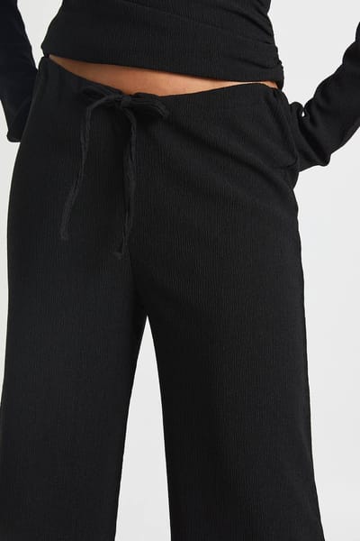 boohoo Dames Top met lange mouwen en broekset met getextureerd wrap-detail | Black | Maat: 6