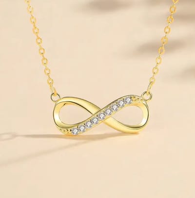 Leerella Prachtige Infinity Ketting van Roestvrij Staal met Zirkoon Goudkleurig- Het Perfecte Cadeau voor Valentijnsdag, Moederdag, of een Verjaardag! 45+5 cm