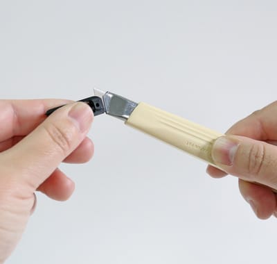 NT Cutter A-300 snijmes met beige kunststof behuizing