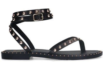 Sacha - Dames - Zwarte leren platte sandalen met goudkleurige studs - Maat 38