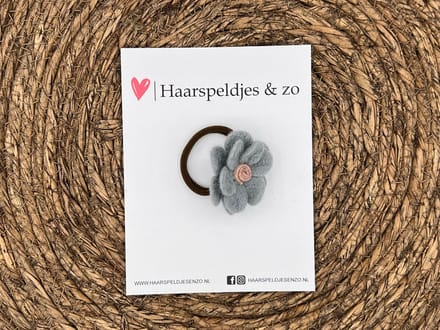 Elastiek - per stuk - hippe kleuren - met bloem - wol - meisjes - blossem - lichtblauw
