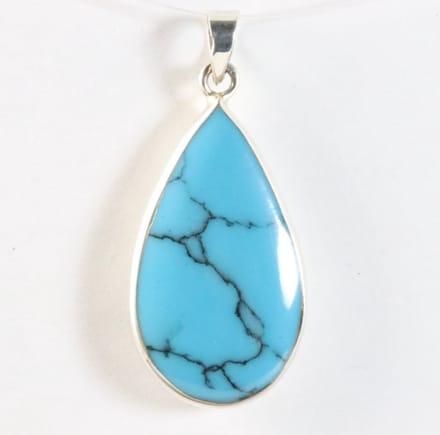 Druppelvormige zilveren hanger met blauwe turkoois
