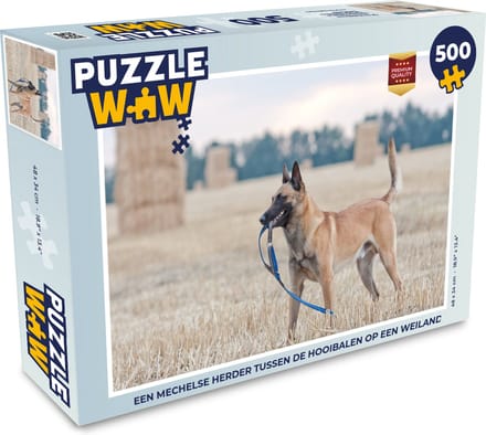 Puzzel Een Mechelse herder tussen de hooibalen op een weiland - Legpuzzel - Puzzel 500 stukjes