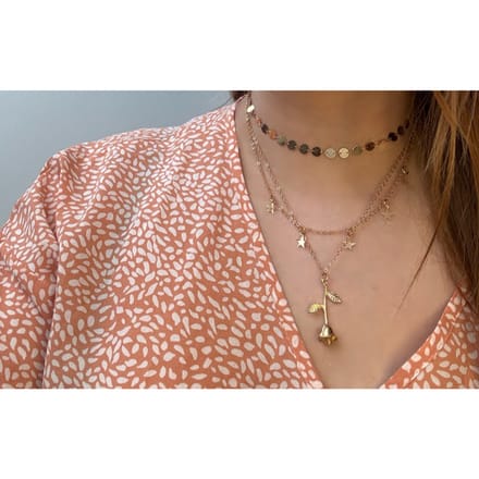 Laagjes ketting met een roos & sterretjes | goud gekleurd