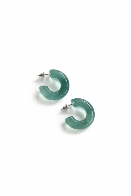 Doorschijnende turquoise oorringen