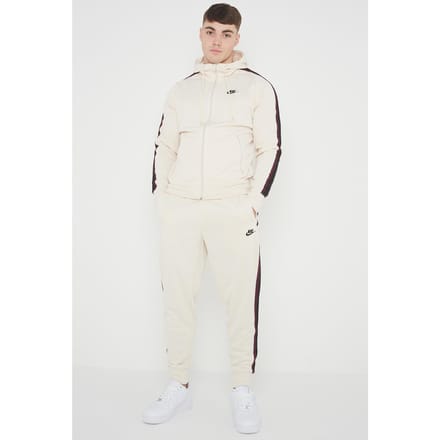 Nike Tribute poly trainingspak voor heren in crème