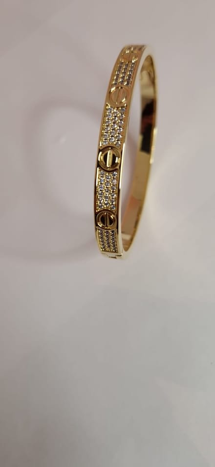 EHH BEAUTY - Goud kleurige bangle met zirkonia steentjes - Luxe bangle - Armband