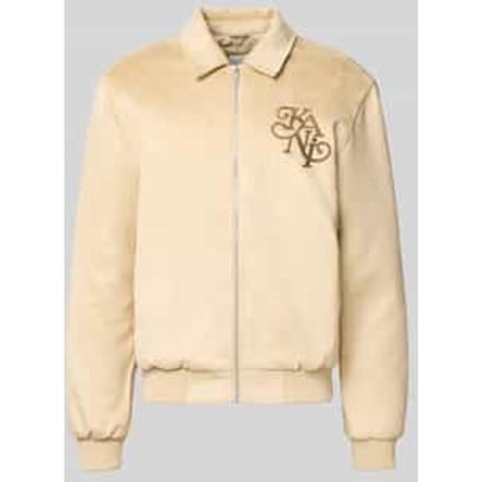 Jack in leerlook met labelstitching