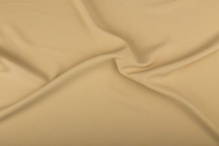 Texture/Polyester stof - Licht beige - 25 meter rol