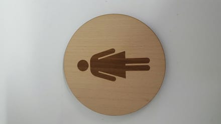 Bordje pictogram vrouw - rond