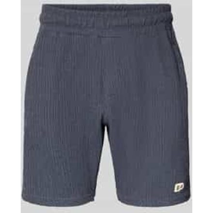 Short met labelpatch model 'LIBCO'