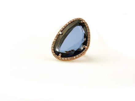 ring in zilver roze verguld model druppel gezet blauwe steen