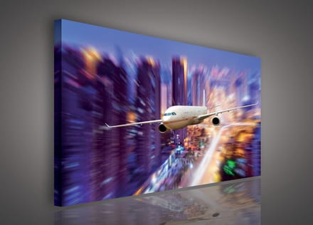 Canvas Schilderij - Vliegtuig - Stad - Toren - Steden - Inclusief Frame - 100x75cm