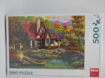 Dino Puzzel van een nostalgisch huis aan het water, 500 stukjes.