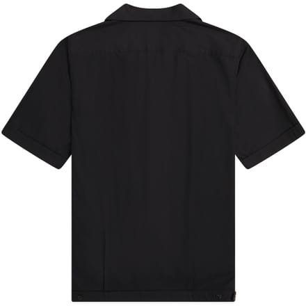 Fred Perry bowlingshirt met zwarte panelen en korte mouwen
