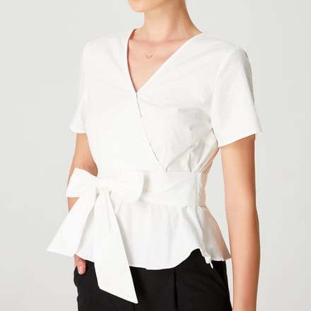 Peplum top met brede strikje