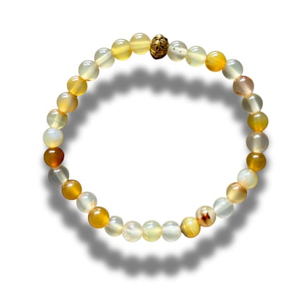 Armband - natuursteen - amber agaat - citrien - 6 mm - 18,5 cm - goudkleurig element lotus