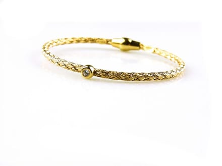 model Uno armband in zilver verguld gezet met cubic zirconia