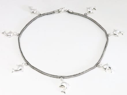 Zilveren enkelband met vossenstaart schakels en dolfijnen