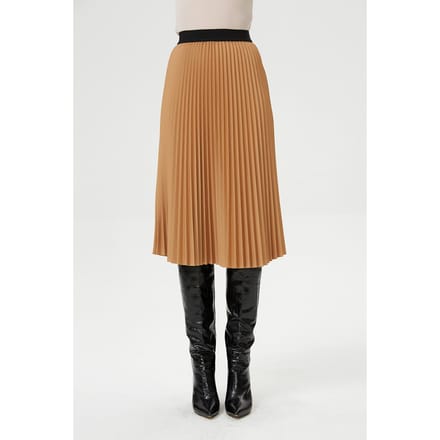 Geplooide rok en contrasterende elastische taille