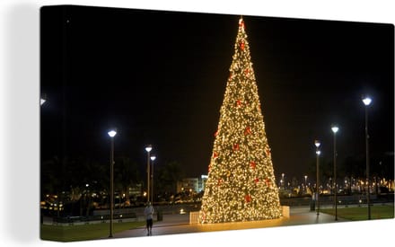 Canvas Schilderij Een enorme kerstboom in de Verenigde Staten - 40x20 cm - Wanddecoratie