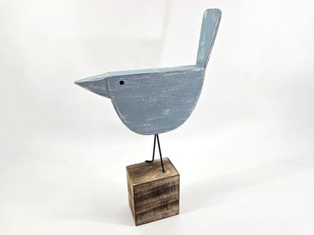 Vogel op blok staart 34x21cm blauw