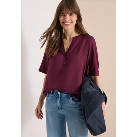 Blouse met gespleten hals en elastische zoom